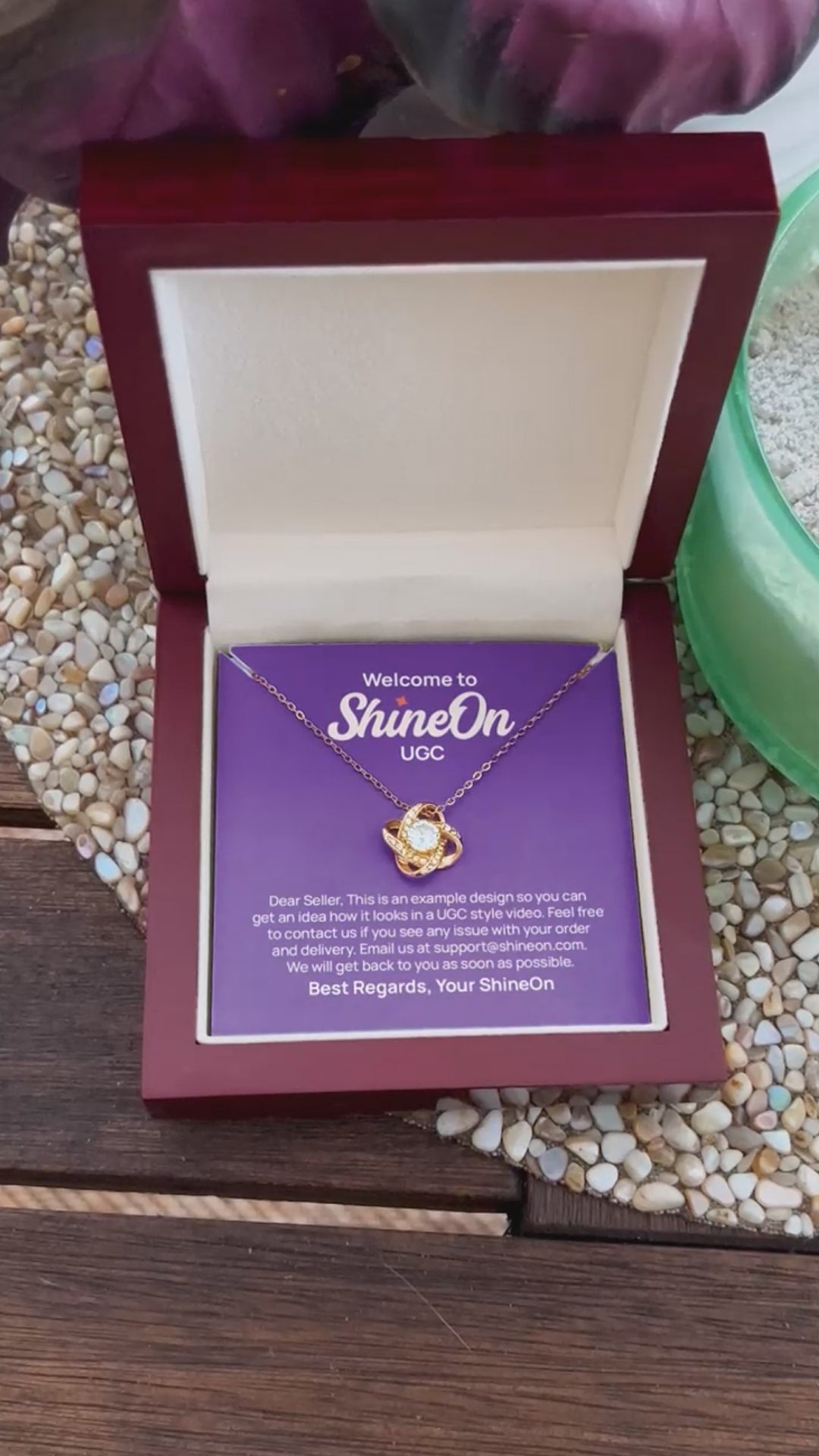 Love Knot Necklace Gold With Box - Wooden Table - UGC 1